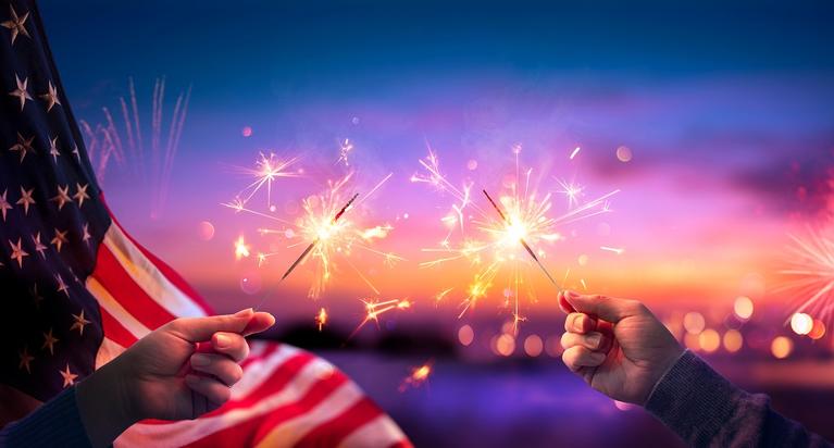 Sparklers and the American flag. 